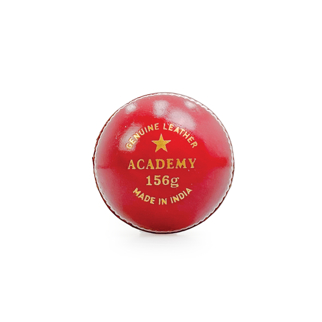Red cricket ball with 'Academy' branding on a white background