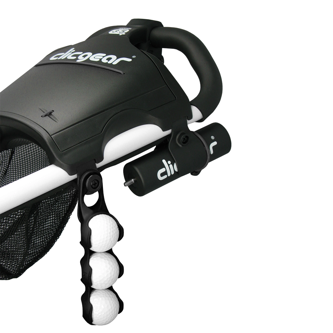 Black golf bag with attached golf ball holder and device on a white background