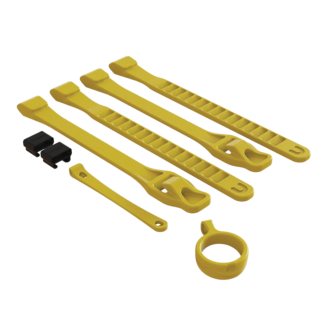 Set of yellow plastic straps and clips on a white background