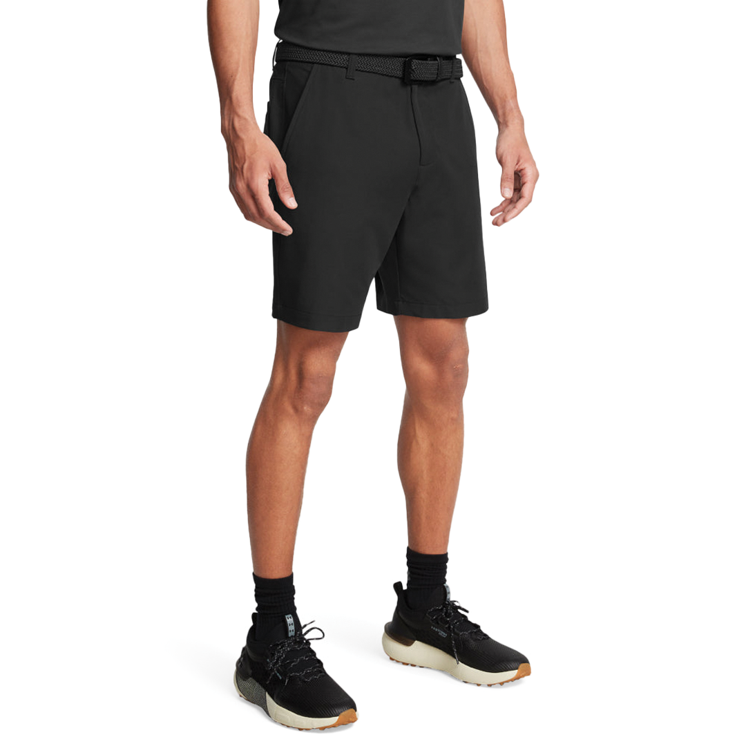 Person wearing black shorts on a white background