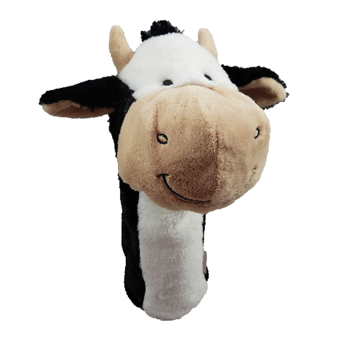 Plush cow toy on a white background